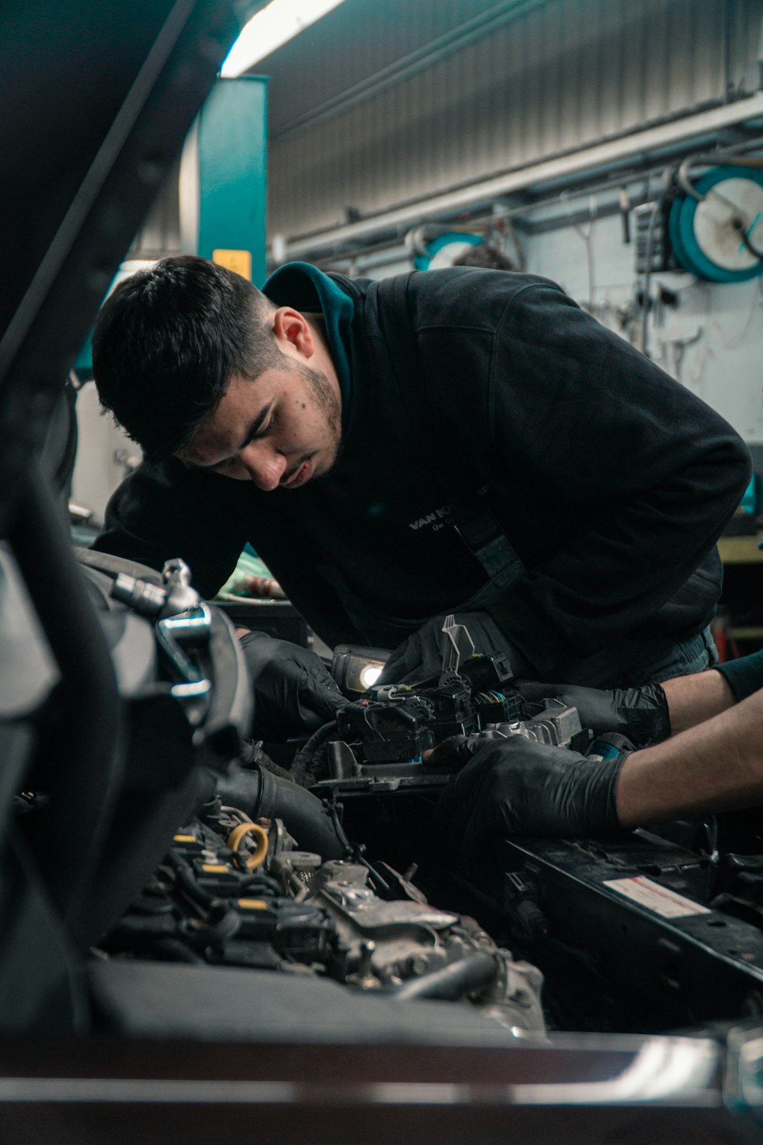 A mechanic fitting and validating every change in the build